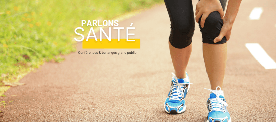 Personne qui cours sur une piste d'athlétisme. Elle se tient le genou car elle s'est blessée.